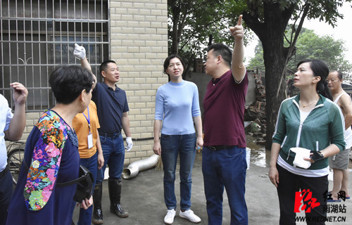 周艳希主持召开全区防汛抗洪会商会-雨湖区站