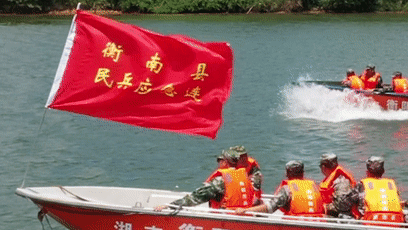 宣读誓词水上冲锋舟演练衡南县人武部纪念民兵工作三落实发表58周年