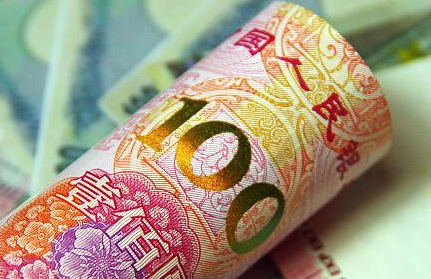 人民币对美元汇率中间价报6.9075元 下调99个基点