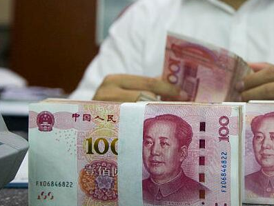 人民币对美元汇率中间价报6.9453元 下调147个基点