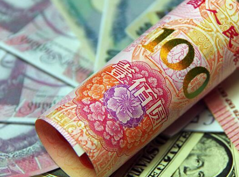 人民币对美元汇率中间价报6.9357元 下调4个基点