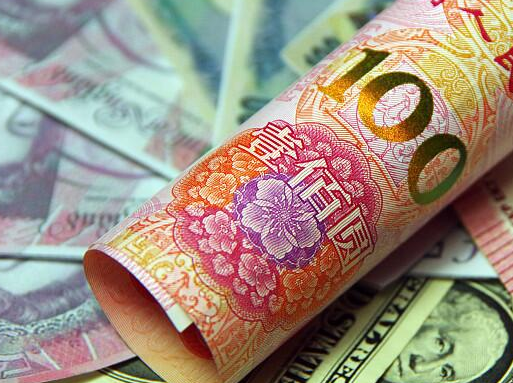 人民币对美元汇率中间价报6.8996元 下调303个基点