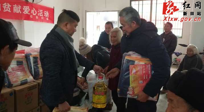 新田：两有为青年致富不忘本回村送温暖