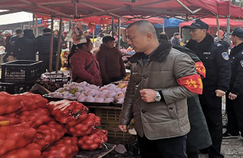 桥江镇:“万人红袖章”  织织平安春节网