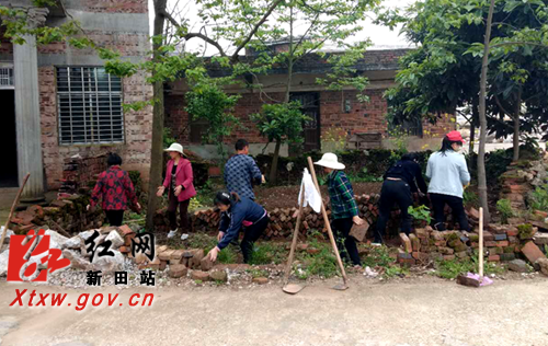 新田县石羊镇塘罗村有支乡风文明志愿服务队