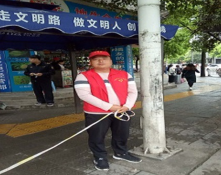 县应急局积极参加文明交通岗志愿者活动