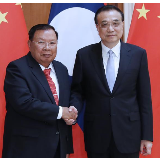 李克强会见老挝人革党总书记、国家主席本扬