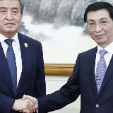 王沪宁会见吉尔吉斯斯坦总统热恩别科夫