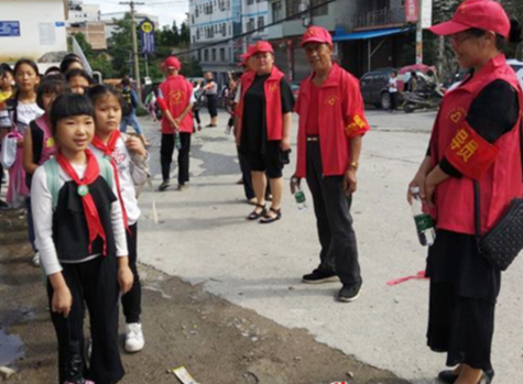文明实践在溆浦丨维护校园安全，社区护校志愿队在行动