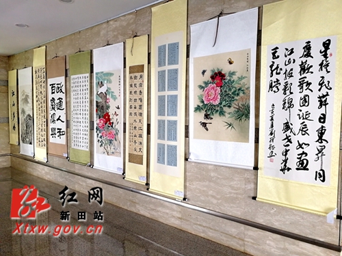 新田县举办建党98周年书画展