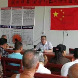 武冈：刘旭明给软弱涣散村上党课