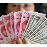人民币即期汇率开盘跌破6.95，离岸人民币跌破6.97