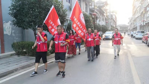 三官寺土家族乡人民政府义务巡逻队挥旗上岗
