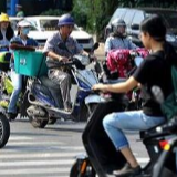 新华每日电讯:电动自行车怎么“动”,考验城市精细化管理