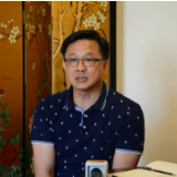 对话香港立法会议员何君尧：暴徒人赃并获可用重典惩戒