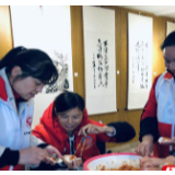 “爱心馅”饺子热气腾腾  志愿者情暖怡智家园