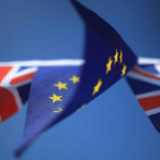 英国议会下院三读通过首相脱欧议案