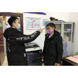 黄草镇：一只额温枪的“温度”