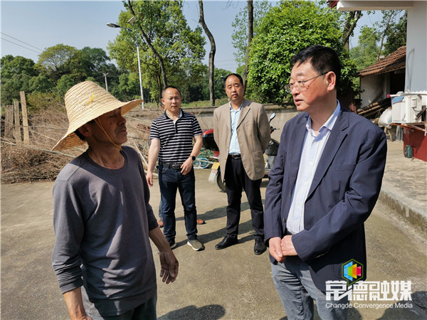 龙虎村人口_龙虎滩村村民执勤图片