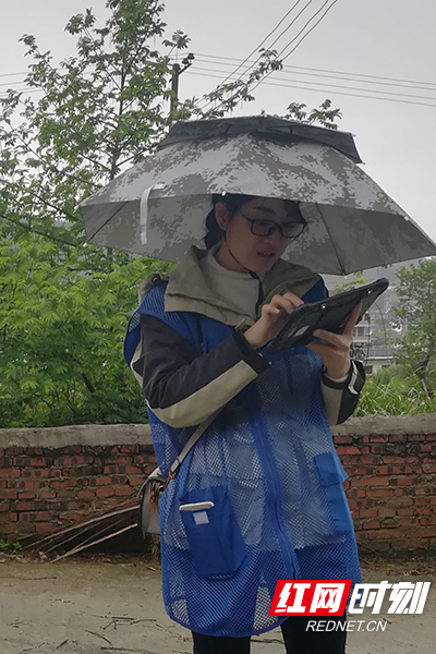 在桂东县三调试点村冒雨外业实地举证副本.jpg