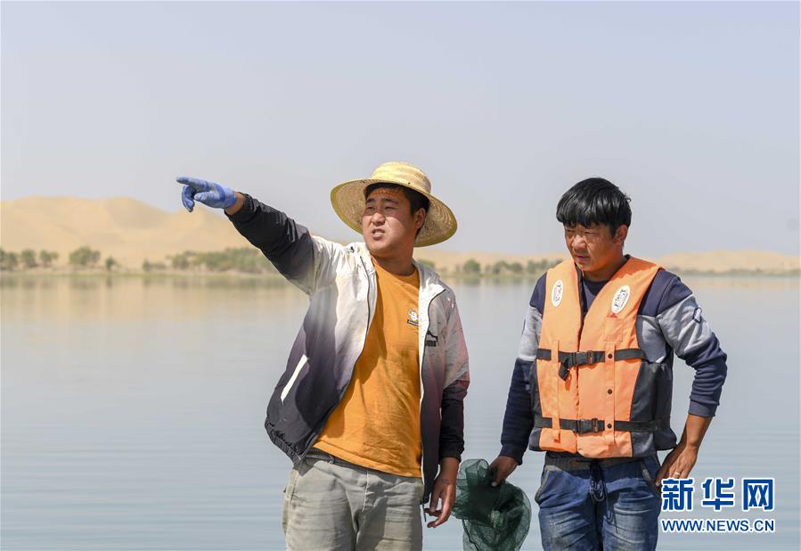 （图片故事）（7）买买江·艾尼：我在“死亡之海”抓螃蟹