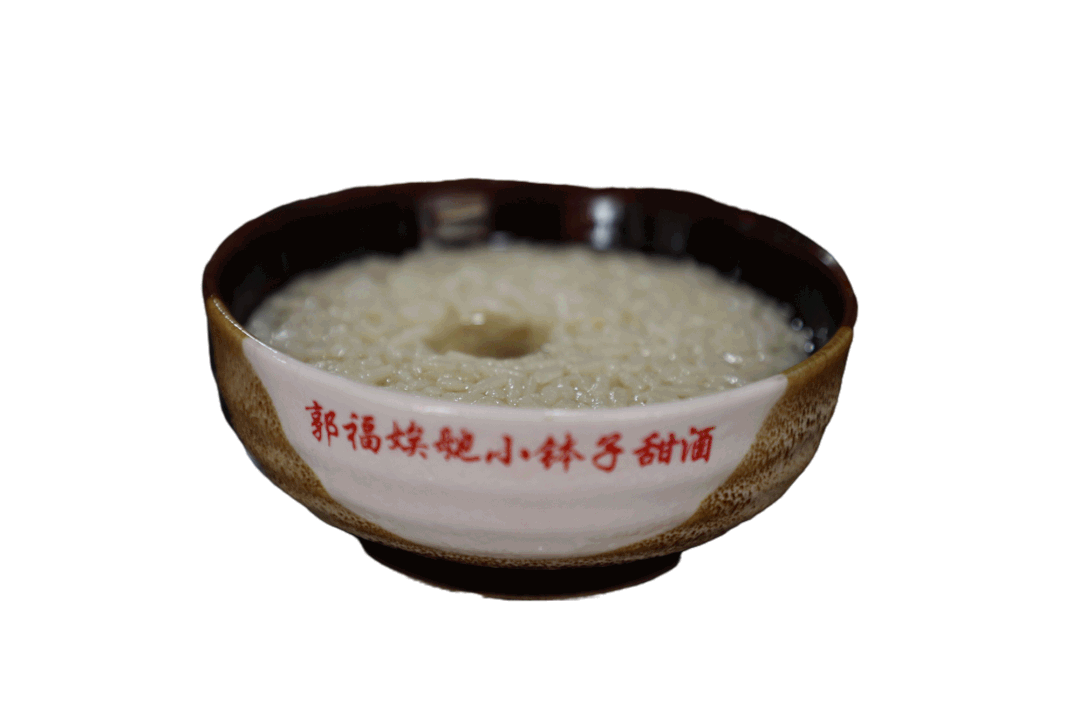 社会新闻 正文小钵子甜酒穿行在小巷深处,穿越窗花,躁动人们的食欲,它