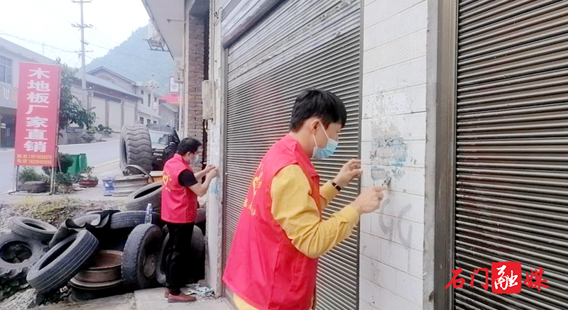 雁池乡：开展清理小广告美化环境志愿服务活动.jpg
