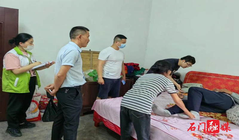 罗坪乡：上门评残，“零距离”惠残助残1.jpg