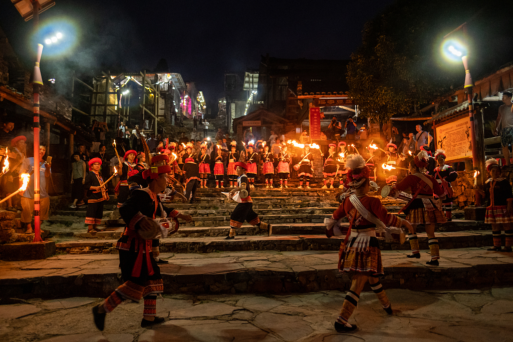 Yao people celebrate the Torch Festival in Nangang, Guangdong Province on August 22, 2020. /CFP
