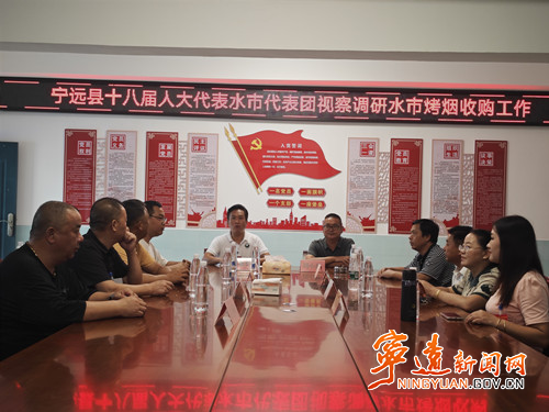 宁远：护航烟农赶“烤”路2_副本500.jpg