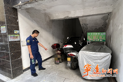 寧遠：兩名小區業主違規停放電動車被警告處罰_副本_副本500.jpg