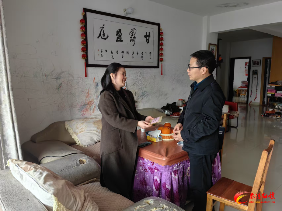 慰问周秀平.jpg