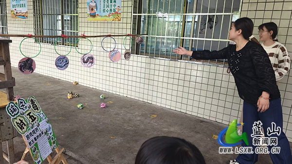 大洞中心小学：“射五毒”传民俗，教职工共庆佳节.jpg