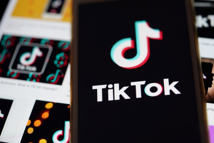 The logo of TikTok is seen on the screen of a smartphone in Arlington, Virginia, the United States, Aug. 30, 2020. (Xinhua/Liu Jie)