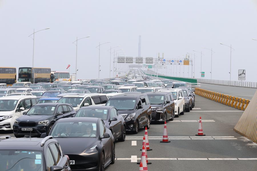 This photo taken on April 6, 2024 shows cars on Hong Kong-Zhuhai-Macao Bridge in south China. (Photo by Wang Xiangguo/Xinhua)